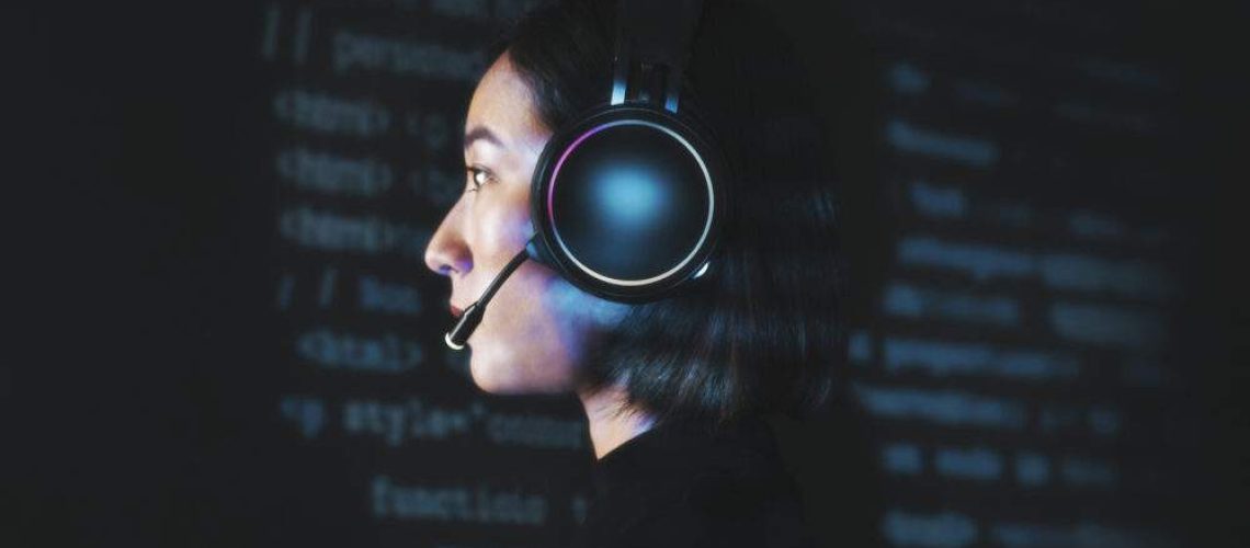 Female hacker cracking the binary code
